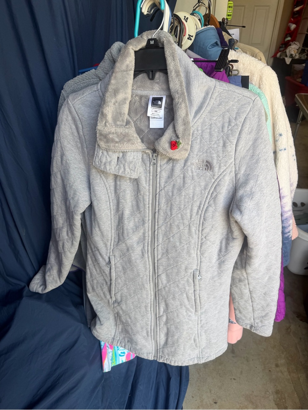 The North Face women’s ' Gray Quilted Fleece Jacket